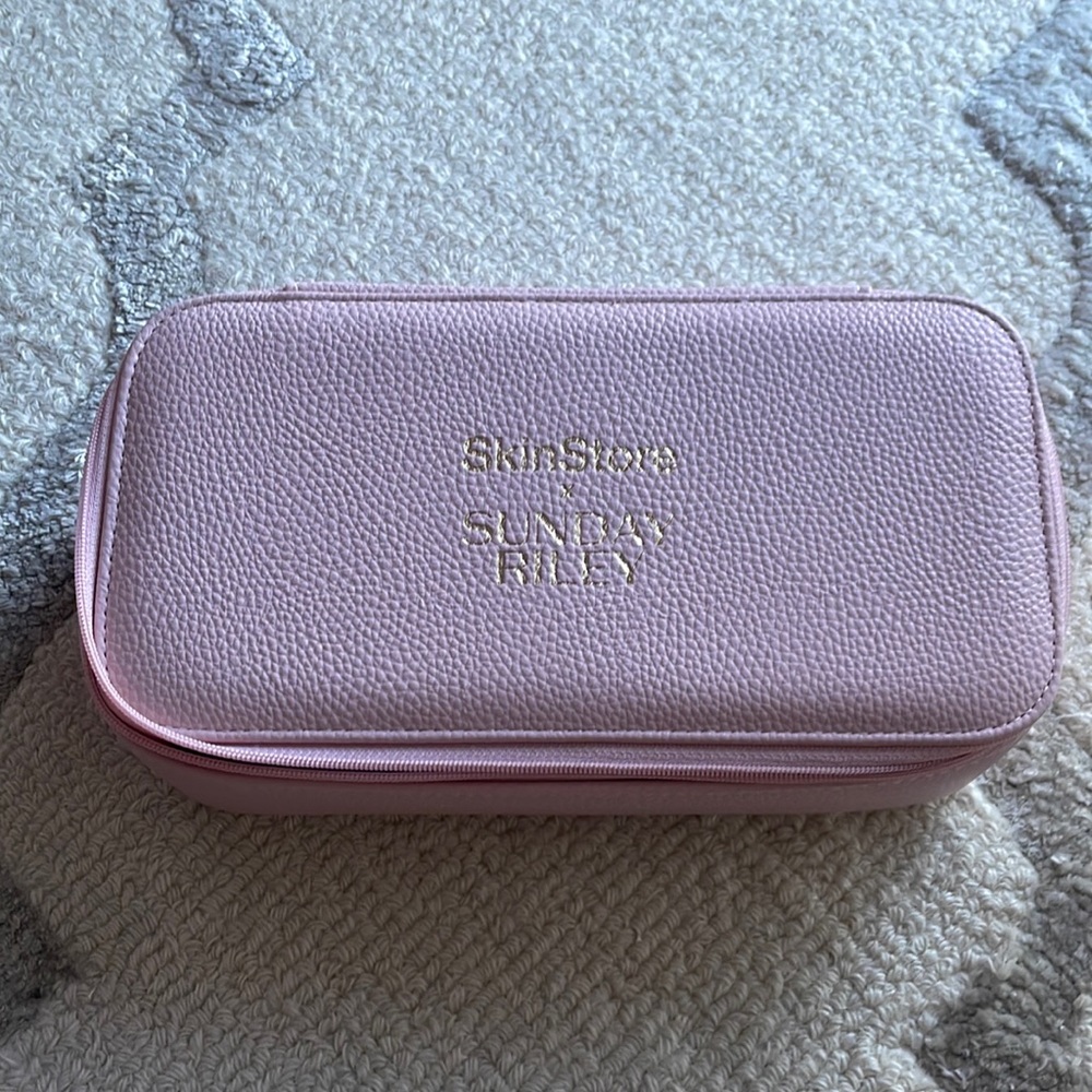 Pink box.  Can be used to store anything or use as a travel bag